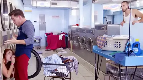 Red-haired is providing a fellatio at the laundromat